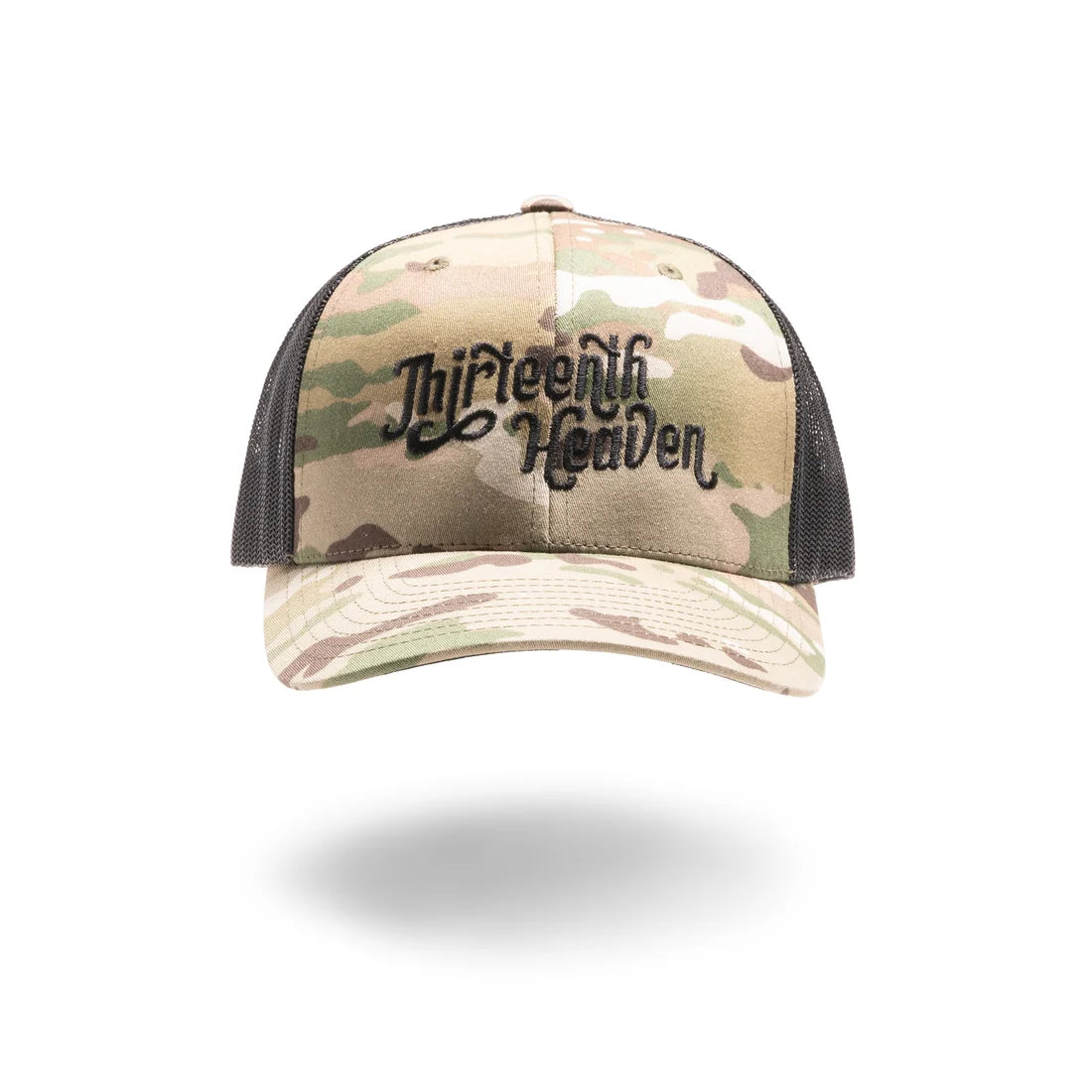 Camouflage trucker hat with 'Thirteenth Heaven' text on a white background