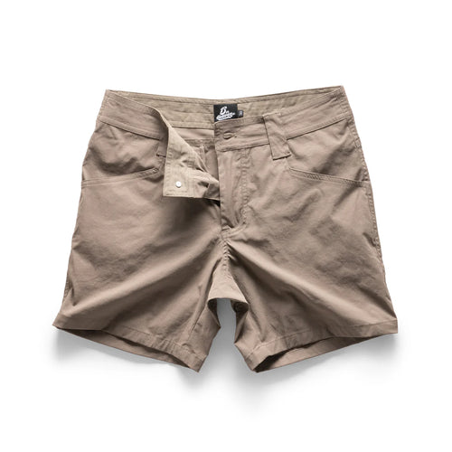 Beige shorts with a brand label on a white background
