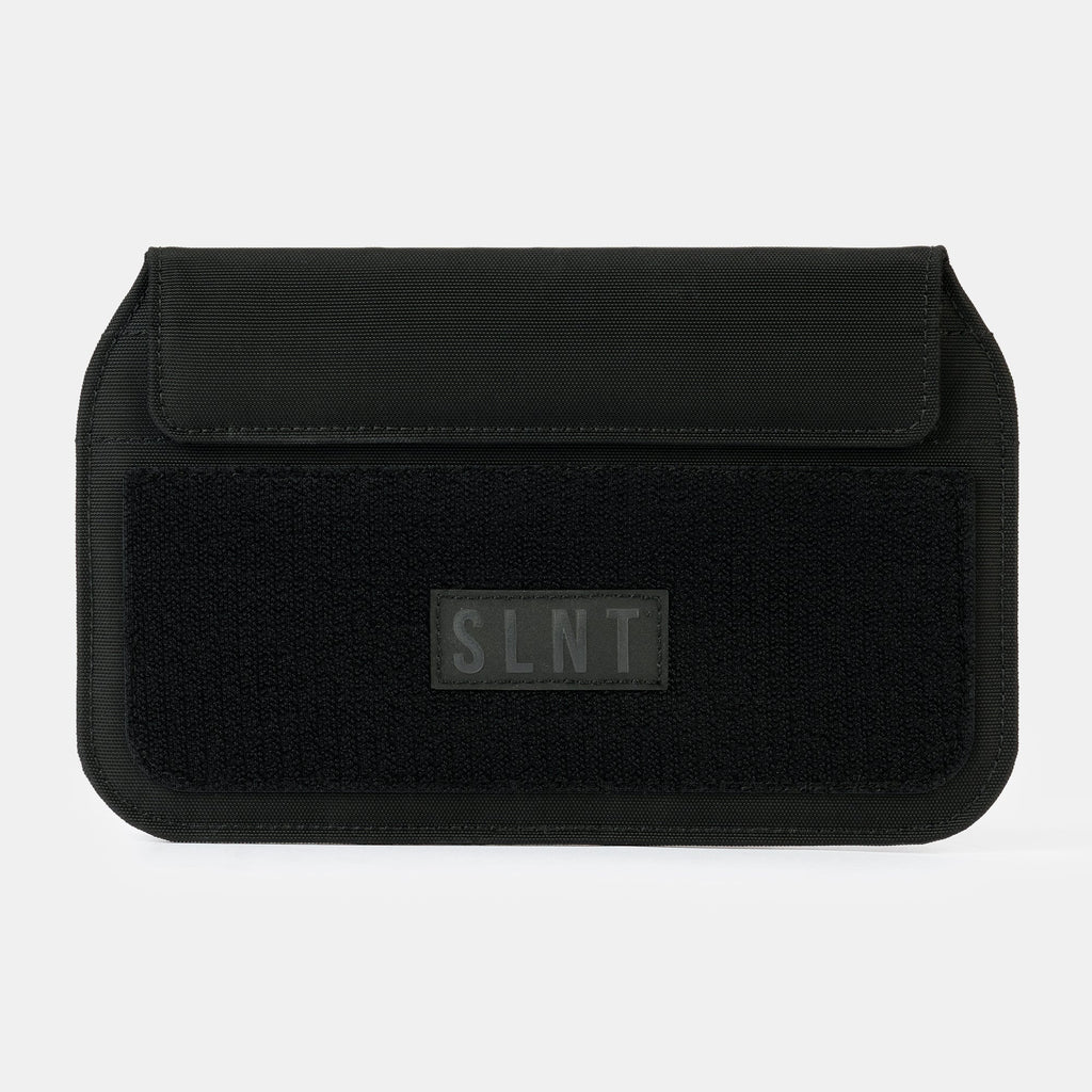 Black pouch with 'SLNT' branding on a white background