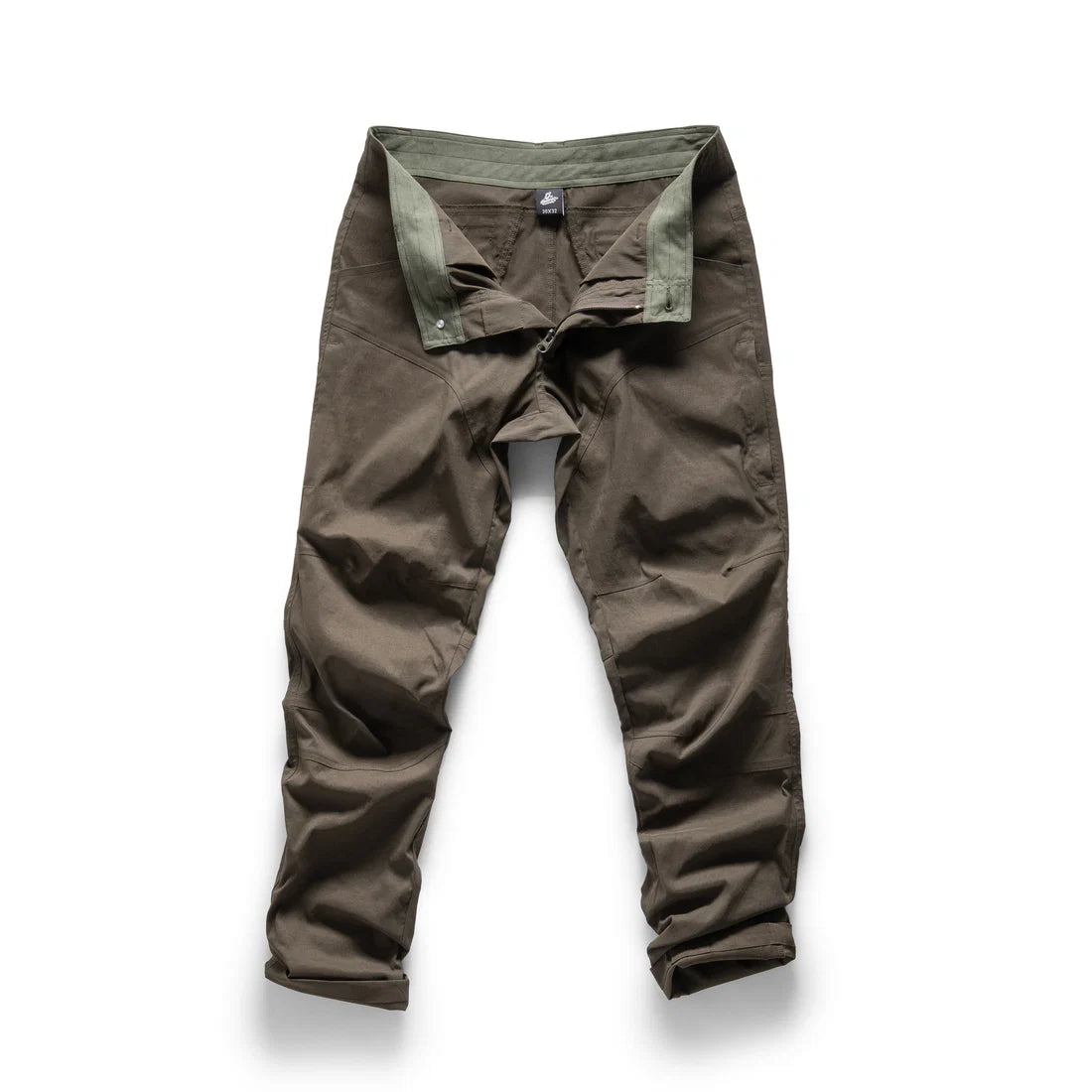 Olive Green 13th Heaven trousers on a white background