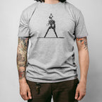 Man wearing Grey T-shirt with a Robotic looking M14 weapon print on a white background
